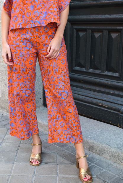 PANTALONES SOL -  FLORES NARANJAS -